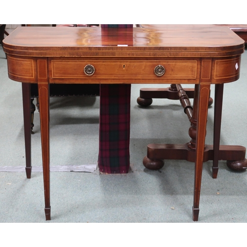 19 - A Victorian walnut and sample wood inlaid fold-over tea table with rectangular top with rounded corn... 