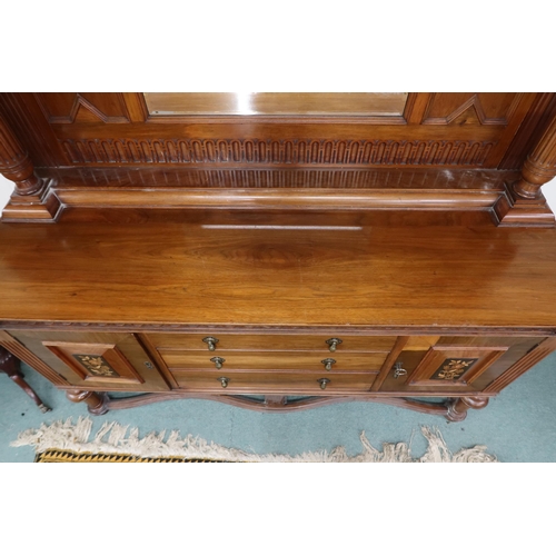 22 - An early 20th century mahogany mirror backed sideboard with moulded cornice over bevelled glass mirr... 