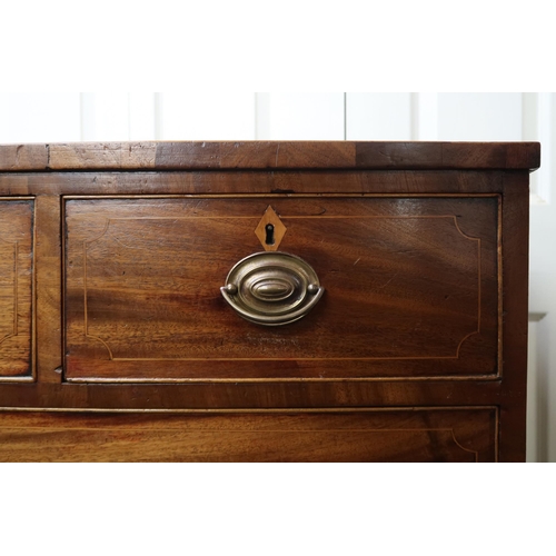 25 - A Victorian mahogany and satinwood inlaid bow front chest of drawers with three short over three lon... 