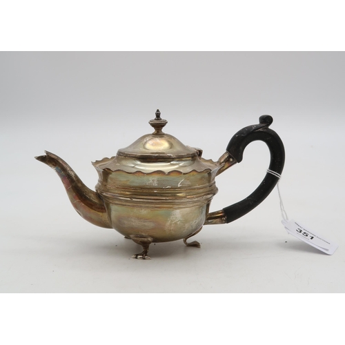 351 - A small silver teapot, Birmingham 1906, of circular form, with a shaped inverted rim, 209gms