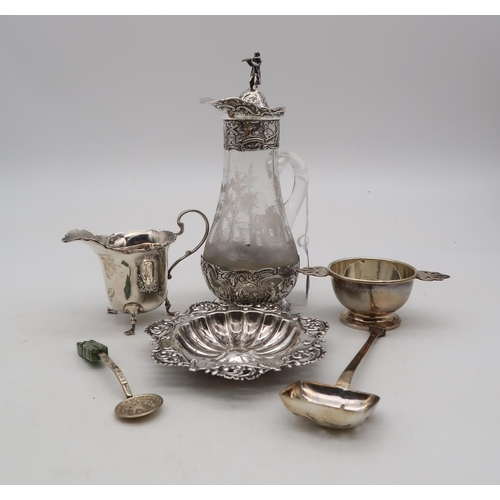 371 - A collection of silver including a small silver quaich, by George Unite, Birmingham, a silver cream ... 