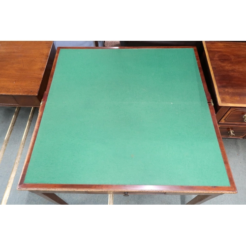 43 - A Victorian mahogany fold-over card table with rectangular top concealing baize lined play surface o... 