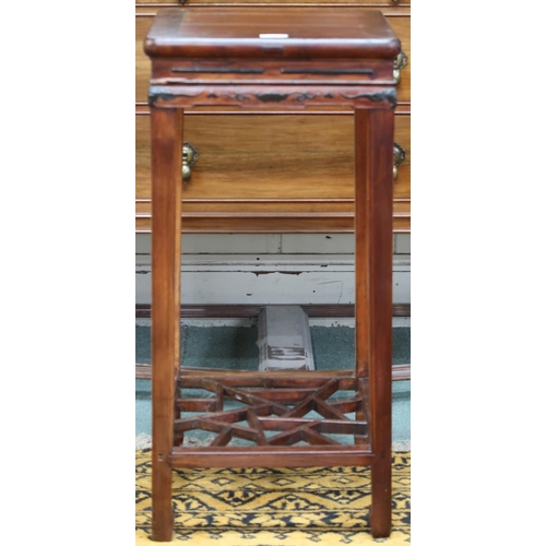 48 - A 20th century Chinese hardwood plant pedestal with square top over carved friezes on shaped square ... 