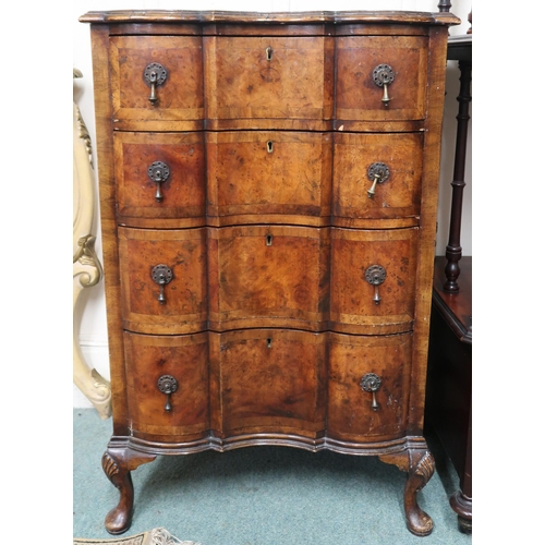 6 - An early 20th century walnut veneered serpentine front four drawer chest on Queen Anne supports, 84c... 
