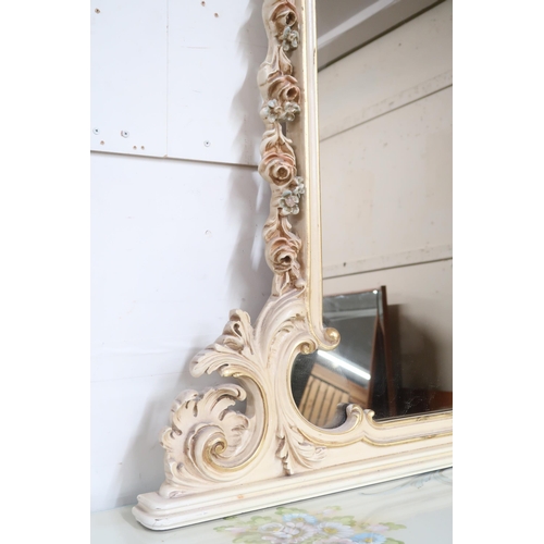 60 - A 20th century cream and gilt rococo style framed overmantle mirror, 152cm high x 135cm wide