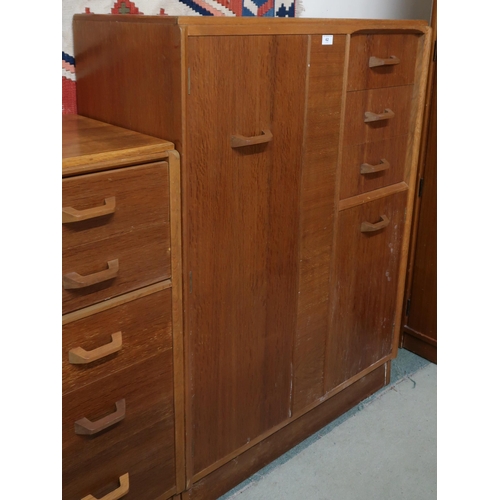 62 - A lot comprising mid 20th century teak G plan E Gomme bachelors wardrobe with single door alongside ... 