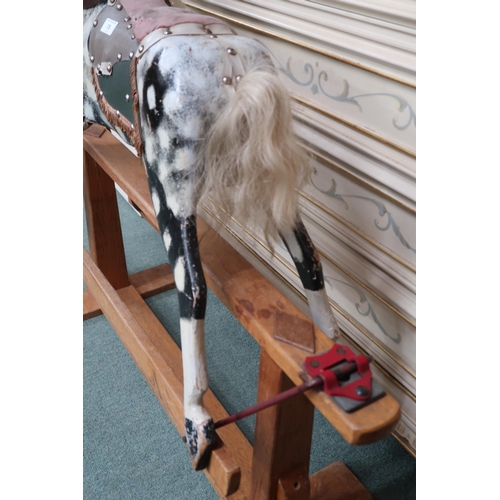 75 - A 20th century child's rocking horse with horse hair mane and tail, leather and vinyl livery on beec... 