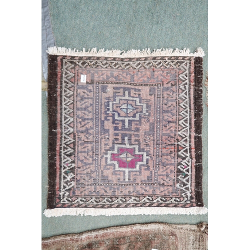 77 - A lot comprising dark blue ground Caucasian rug with red crossed medallions, red and cream borders, ... 