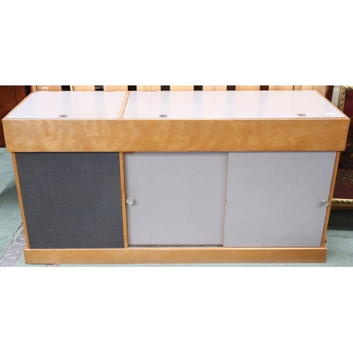 89 - A mid 20th century teak and formica stereo cabinet with two hinged tops over pair of sliding doors, ... 