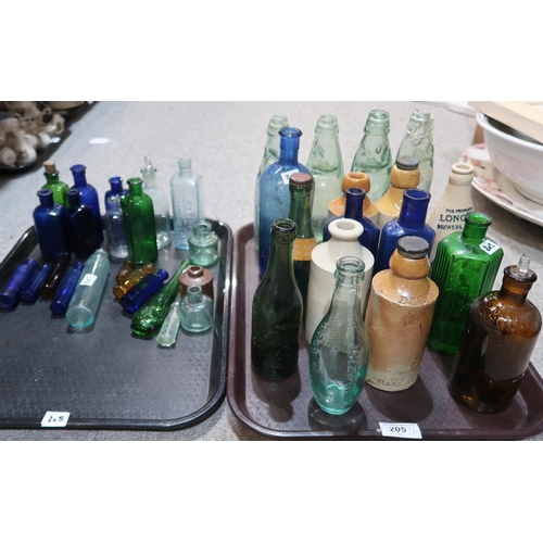 205 - A collection of glass and stoneware bottles including Deeks Chemist Shanklin, Mew Langton & Co I... 