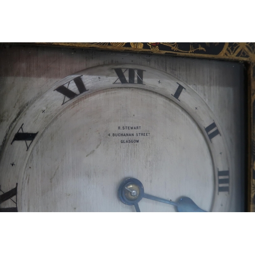 249 - A Japanned lacquer clock with silvered dial, retailed by R Stewart, Glasgow