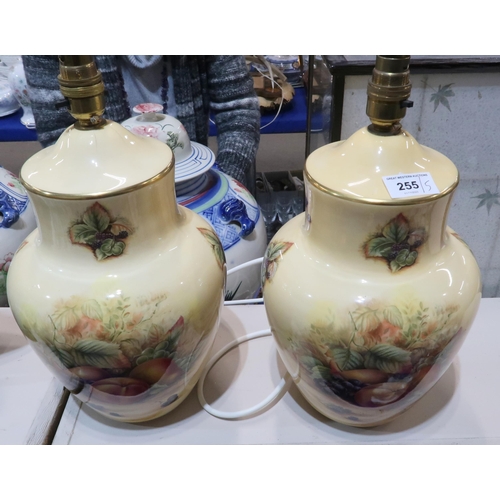 255 - A pair of Aynsley Orchard Gold table lamps, together with a plate and two dishes