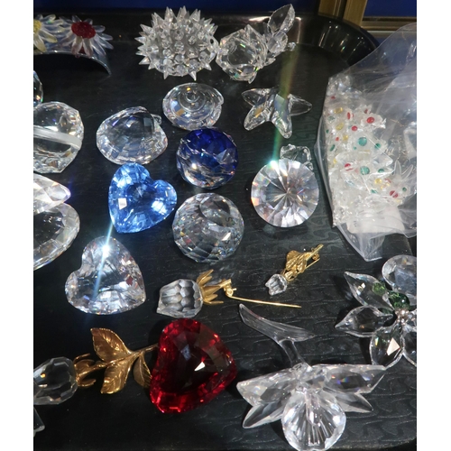 259 - A collection of Swarovski crystal ornaments including gems, hearts, shells, Santa and Sleigh, angel,... 