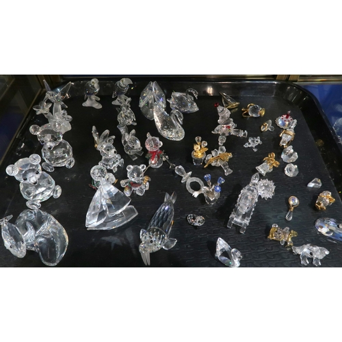 259A - A collection of Swarovski crystal ornaments including walrus, yacht, swans, kangaroo, hummingbird, t... 