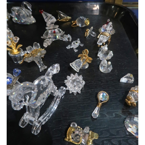 259A - A collection of Swarovski crystal ornaments including walrus, yacht, swans, kangaroo, hummingbird, t... 