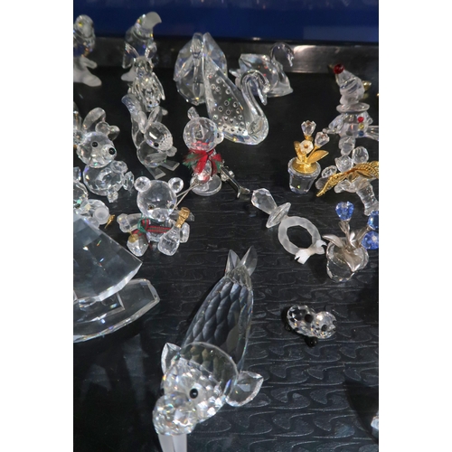 259A - A collection of Swarovski crystal ornaments including walrus, yacht, swans, kangaroo, hummingbird, t... 