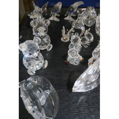 259A - A collection of Swarovski crystal ornaments including walrus, yacht, swans, kangaroo, hummingbird, t... 