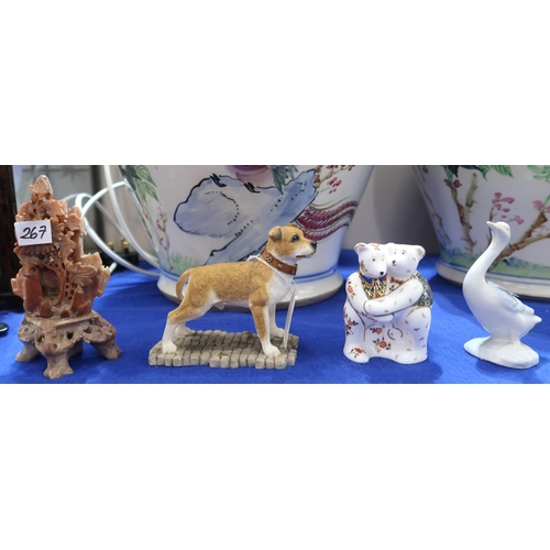 267 - A soapstone carving, a Royal Crown Derby teddy paperweight, a Sherrat and Simpson dog and a ceramic ... 