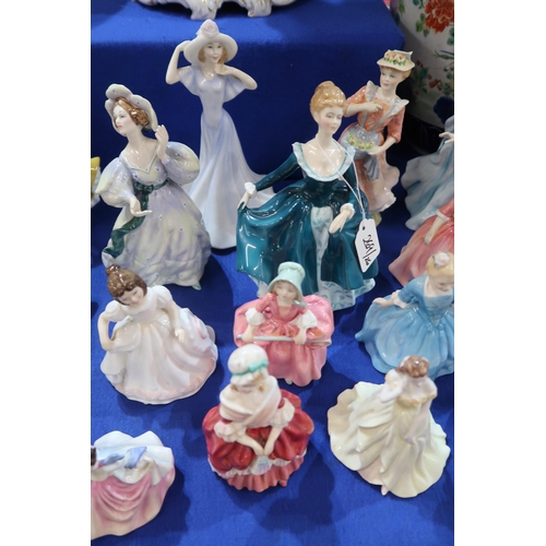 269 - A collection of Royal Doulton figures of ladies and girls 