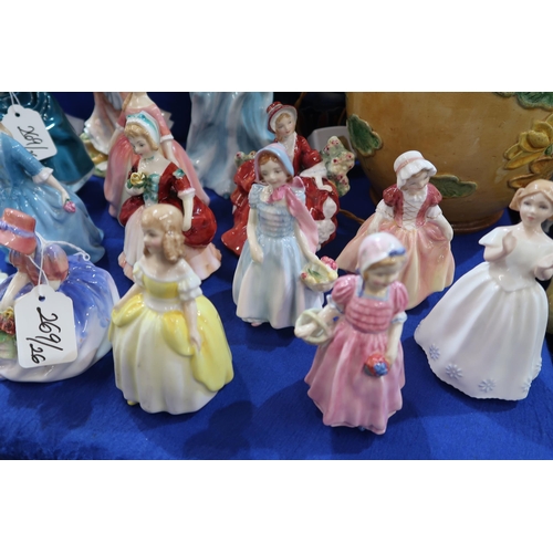 269 - A collection of Royal Doulton figures of ladies and girls 