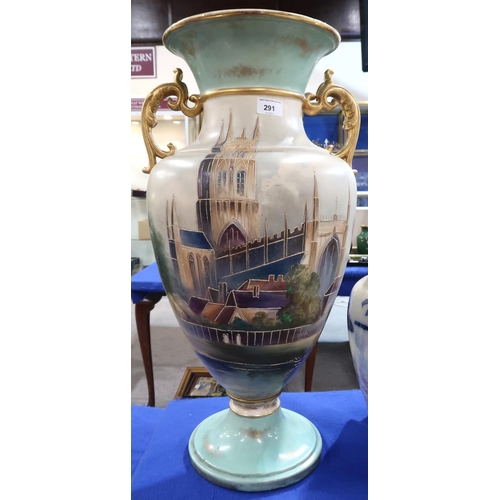 291 - A large decorative two handled vase, with tubeline decoration of a cathedral