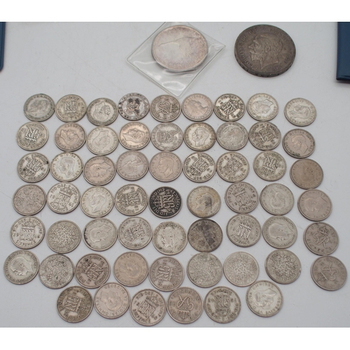 413 - A lot of coins comprising a George V crown 1935, Canadian dollar 1967, Elizabeth II crowns, the... 