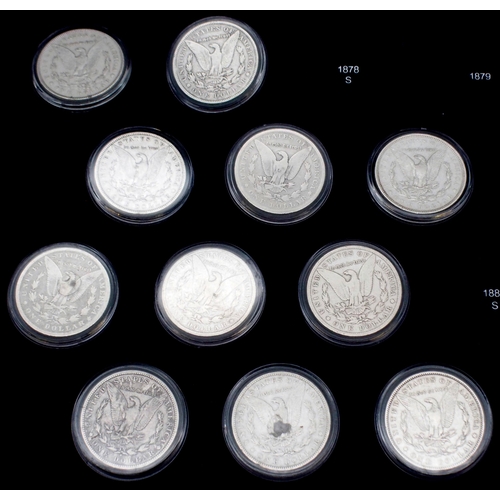 424 - The Ultimate Morgan Silver Dollar Collection, part set with forty seven Morgan Dollars in a wood col... 