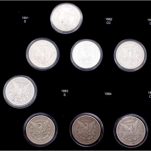 424 - The Ultimate Morgan Silver Dollar Collection, part set with forty seven Morgan Dollars in a wood col... 