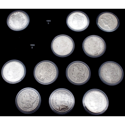 424 - The Ultimate Morgan Silver Dollar Collection, part set with forty seven Morgan Dollars in a wood col... 