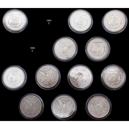 424 - The Ultimate Morgan Silver Dollar Collection, part set with forty seven Morgan Dollars in a wood col... 