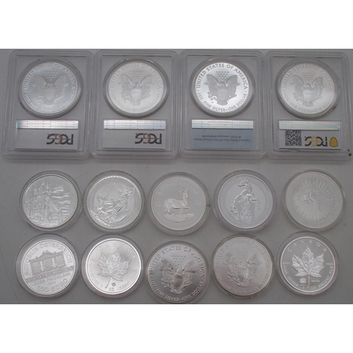 430 - A lot comprising various silver coins with US First Strike Dollars, White Greyhound of Richmond 2 oz... 