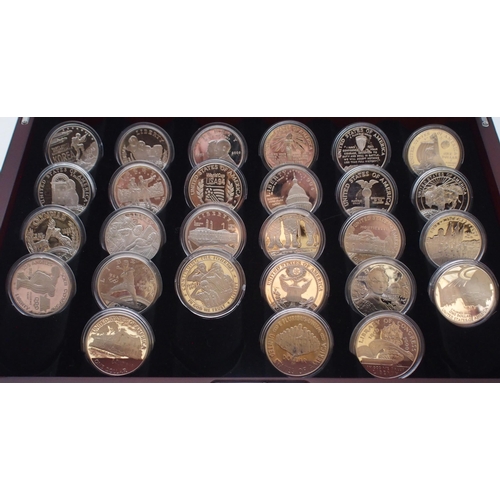 435 - US Silver Dollars to feature historical designs, 27 coins in a wood display case