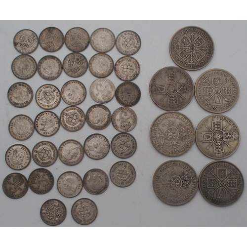 438 - A coin collection to include US silver dollars, Elizabeth II crowns, commemorative coins, three penc... 