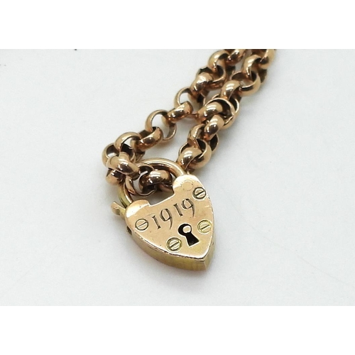 707 - A 9ct rose gold belcher chain with lobster law clasp with heart shaped pendant bearing the engraved ... 