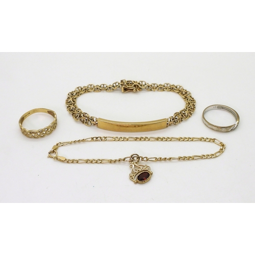 710 - a collection of 9ct gold to include an id bracelet, with fancy chain link strap, two rings and a bra... 