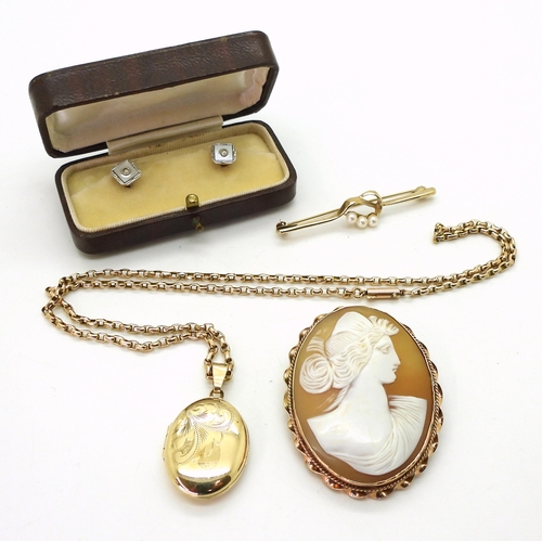 724 - A 9ct gold locket and chain, length of locket with bail 3.5cm, length of chain 48cm, a 9ct mounted c... 