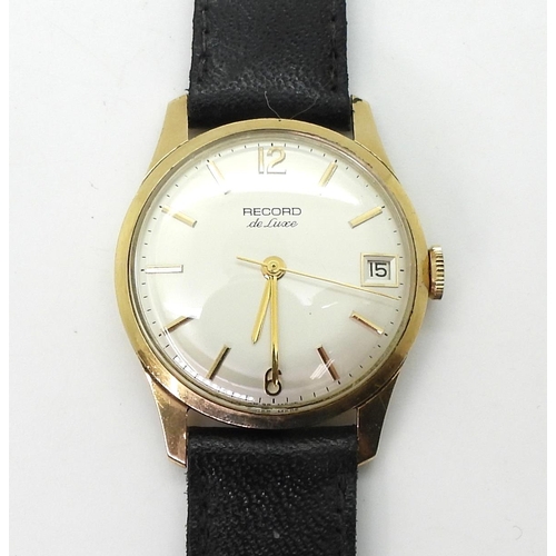 726 - A 9ct gold Record De Luxe, gents wristwatch with black leather strap, diameter of the dial 3.3cm, we... 