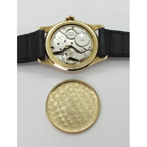 726 - A 9ct gold Record De Luxe, gents wristwatch with black leather strap, diameter of the dial 3.3cm, we... 