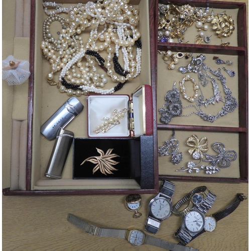 818 - A jewellery box full of costume jewellery to include a Trifari brooch, item set with marcasite, two ... 