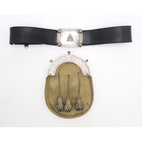 2620 - AN EARLY-20th CENTURY EDINBURGH SILVER-MOUNTED BUCKSKIN SPORRAN AND CORRESPONDING KILT BELTThe cantl... 