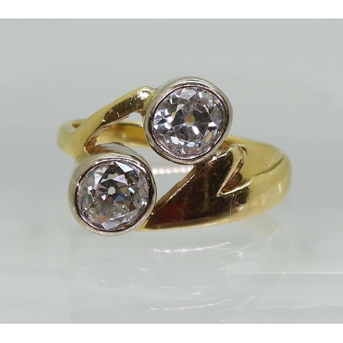 A SUBSTANTIAL TWIN STONE RING