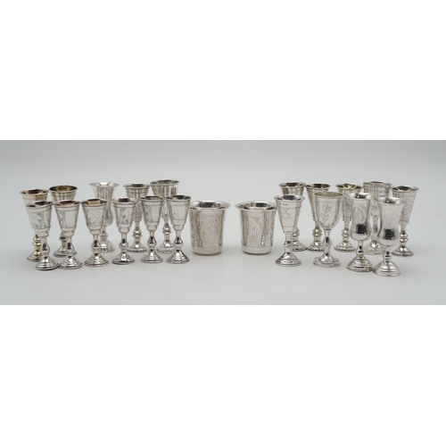 2437 - A COLLECTION OF SILVER KIDDUSH CUPSincluding a pair by Moses Salkind & Co, London 1901, another ... 