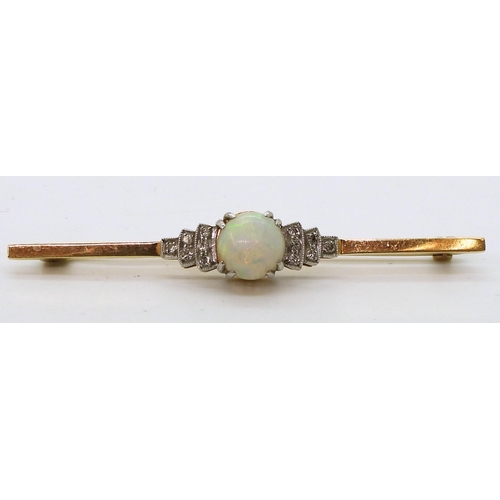 2780 - AN OPAL AND DIAMOND BROOCHset in 18ct yellow gold and platinum, set with a central round opal of app... 