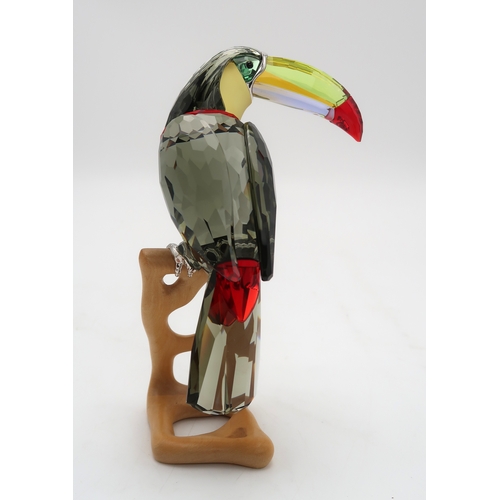 2197 - A SWAROVSKI CRYSTAL BIRDS OF PARADISE  FIGUREof a Toucan on wooden base, 20cm high... 