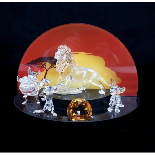 2202 - FOUR SWAROVSKI CRYSTAL WALT DISNEY CHARACTERS FROM THE LION KINGincluding Mufasa, Simba, Pumba, and ... 