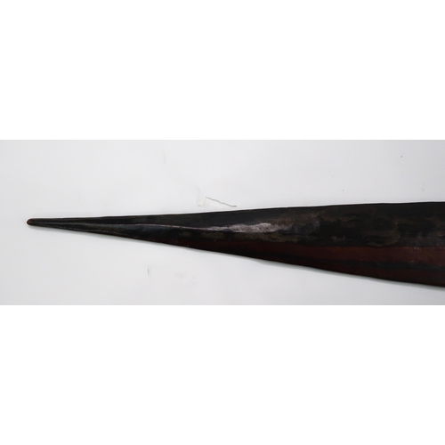 2326 - A POLYNESIAN FISH PADDLEInset with shell, 156cm long and a Polynesian club carved with geometric ban... 