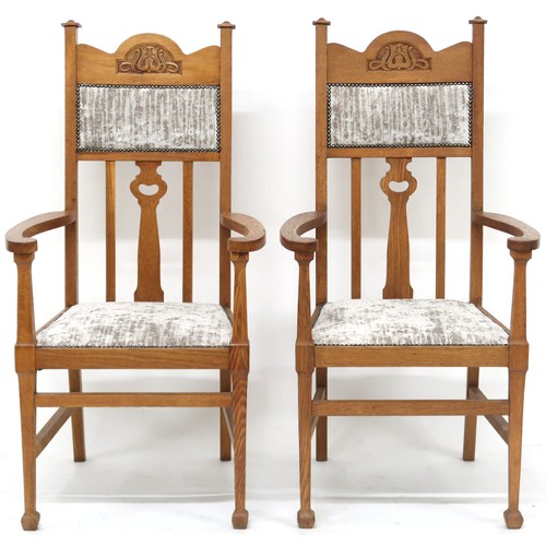 2050 - A PAIR OF LATE VICTORIAN OAK ARTS & CRAFTS OPEN ARMCHAIRS with grey velvet upholstery on backres... 