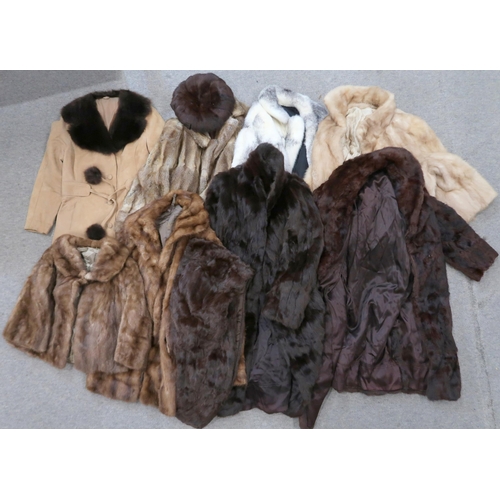 136 - A collection of fur coats and jackets, including a white and blonde example, a fur trimmed suede coa... 