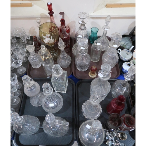 142 - A collection of antique and other decanters, including a pair with flower cut decoration, a Edinburg... 