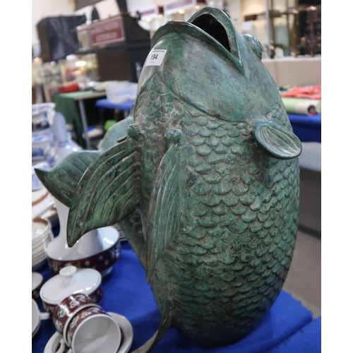 194 - A large verdigris metal fish ornament